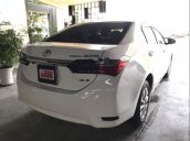 Cần bán gấp Toyota Corolla altis 1.8E CVT sản xuất 2018, màu trắng, xe đẹp 