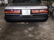 Cần bán Toyota Camry 1990, màu bạc số tự động