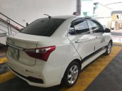 Bán Hyundai Grand i10 1.2AT sedan, màu trắng, số tự động, sản xuất 2018, đi 8000km