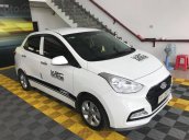 Bán Hyundai Grand i10 1.2AT sedan, màu trắng, số tự động, sản xuất 2018, đi 8000km