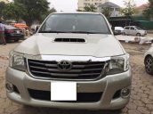 Cần bán Toyota Hilux 2014, máy dầu, số sàn, màu bạc, 2 cầu, nhập Thái Lan