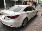 Gia đình cần bán Mazda 6 sản xuất 2016, số tự động, bản 2.0, màu trắng