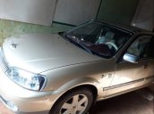 Cần bán lại xe Ford Laser năm 2003, màu vàng, giá tốt