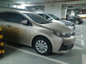 Bán Toyota Corolla Altis 1.8E AT màu vàng, sản xuất và đăng ký 12/2018, biển Hà Nội