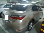 Bán Toyota Corolla Altis 1.8E AT màu vàng, sản xuất và đăng ký 12/2018, biển Hà Nội