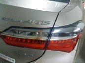 Bán Toyota Corolla Altis 1.8E AT màu vàng, sản xuất và đăng ký 12/2018, biển Hà Nội