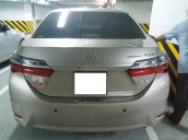 Bán Toyota Corolla Altis 1.8E AT màu vàng, sản xuất và đăng ký 12/2018, biển Hà Nội