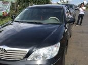 Bán Toyota Camry năm 2004, màu đen số sàn, giá 299tr