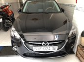 Bán Mazda 2 Sedan 1.5AT màu đen VIP số tự động sản xuất 2016, biển Sài Gòn, đi 15000km