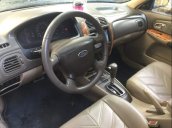 Bán Ford Laser sản xuất 2005, màu đen, nhập khẩu, bản full