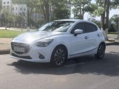 Bán ô tô Mazda 2 năm 2016, màu trắng, xe đang hoạt động bình thường