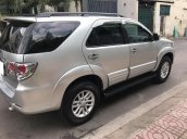 Cần tiền bán gấp em cọp Fortuner 2013, số tự động, máy xăng, màu bạc