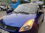 Cần bán gấp Suzuki Swift AT sản xuất năm 2014, màu xanh lam 