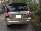 Gia đình cần bán chiếc xe ô tô Toyota Innova 2.0E, màu ghi vàng, SX 2013