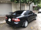 Bán xe Mazda 626 đời 2004, màu đen, còn rất chất