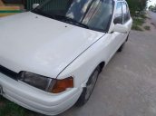 Cần bán xe Mazda 323 sản xuất năm 1994, màu trắng, nhập khẩu nguyên chiếc, 55 triệu