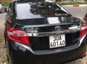 Cần bán lại xe Toyota Vios 2014, màu đen số sàn