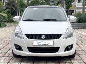 Bán ô tô Suzuki Swift 1.4AT 2014, màu trắng - Nội thất như mới