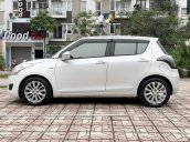 Bán ô tô Suzuki Swift 1.4AT 2014, màu trắng - Nội thất như mới