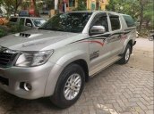 Bán Toyota Hilux G 4x2 MT đời 2015, màu bạc chính chủ