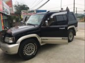 Bán Isuzu Trooper đời 2002, màu đen, giá chỉ 123 triệu