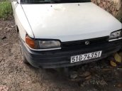 Bán Mazda 323 đời 1996 màu trắng, máy còn chạy ngon