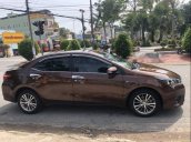 Chính chủ bán Toyota Corolla altis 2015 AT sản xuất năm 2015, màu nâu