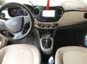 Bán Hyundai Grand i10 sedan 1.2MT màu nâu titan, số sàn, bản đủ, sản xuất 2018