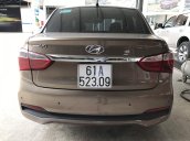 Bán Hyundai Grand i10 sedan 1.2MT màu nâu titan, số sàn, bản đủ, sản xuất 2018