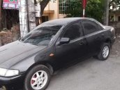 Bán xe Mazda 323 năm sản xuất 1997, màu đen, xe nhập, 95tr