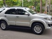 Gia đình bán Toyota Fortuner 2013, màu bạc số sàn