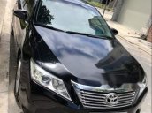 Cần bán Toyota Camry năm 2014, màu đen còn mới, xe gia đình