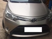 Cần bán lại xe Toyota Vios E năm 2015, màu vàng số tự động, giá chỉ 415 triệu