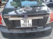 Lên đời bán lại xe Daewoo Lacetti 2009, màu xanh đen