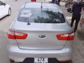 Cần bán Kia Rio đời 2016, màu bạc, xe bảo dưỡng thường xuyên