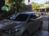 Cần bán xe Toyota Vios E 1.5 năm 2015, màu vàng cát