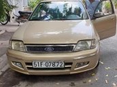 Bán xe Ford Laser Deluxe 1.6 MT đời 2002, màu vàng cát, 260 triệu