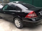 Bán lại xe Ford Mondeo 2.5 đời 2003, màu đen như mới