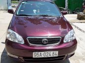 Xe Toyota Corolla altis năm 2002, màu đỏ số sàn