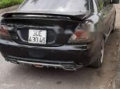 Bán Mitsubishi Lancer đời 2004, màu đen, xe nhập, giá chỉ 190 triệu