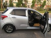 Cần bán Hyundai Grand i10 sản xuất năm 2015, màu bạc, xe nhập xe gia đình