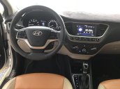 Bán Hyundai Accent 1.4AT màu trắng, số tự độn, g sản xuất 2018, bản tiêu chuẩn đi 16000km