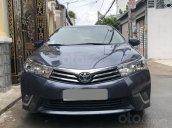 Bán Toyota Altis 2015 số sàn màu xanh rất đẹp