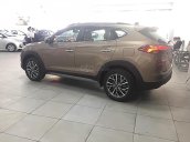 Bán xe Hyundai Tucson 2.0 AT CRDi sản xuất năm 2019, màu vàng 