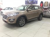 Bán xe Hyundai Tucson 2.0 AT CRDi sản xuất năm 2019, màu vàng 