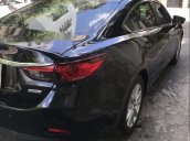 Cần bán Mazda 6 năm 2015, màu đen, đi đúng đồng hồ 35000 km