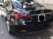 Cần bán Mazda 6 năm 2015, màu đen, đi đúng đồng hồ 35000 km