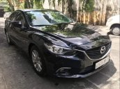 Cần bán Mazda 6 năm 2015, màu đen, đi đúng đồng hồ 35000 km