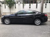 Cần bán Mazda 6 năm 2015, màu đen, đi đúng đồng hồ 35000 km