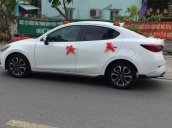 Cần bán Mazda 2 AT sản xuất 2017, màu trắng, xe nhà mình mua mới 7/2017